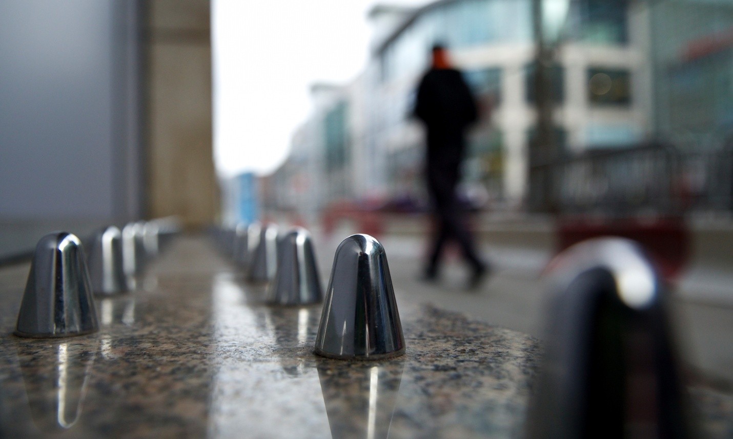 Defensive Architecture Creates Unlivable Cities, "Anti-homeless" spikes installed in Manchester. Image © Christopher Thomond via the Guardian