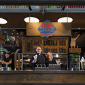 Staff at Bram Ladage, one of Markthal's stalls. Image © Daria Scagliola