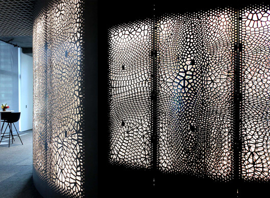 Big Data Becomes Architecture in This CNC-Milled Screen Wall for IBM