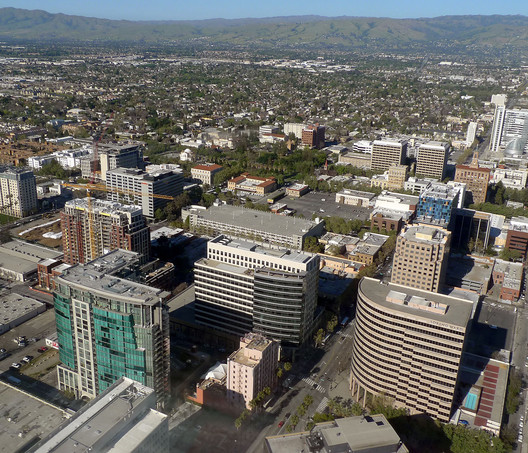 #5 San Jose. Median Price: $1,000,000, Median Income: $104,100, Median Multiple: 9.6. Image © <a href='https://commons.wikimedia.org/wiki/File:San_Jose_CA_Downtown_aerial_view_photo_D_Ramey_Logan.jpg'>Wikimedia user Don Ramey Logan</a> licensed under <a href='http://https://creativecommons.org/licenses/by/4.0/deed.en'>CC BY 4.0</a>