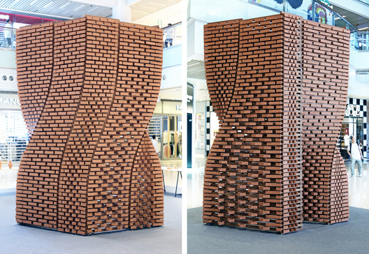 More Than 2,000 Unique Robotically Manufactured Bricks Generate Variable Walls in This Pavilion