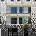 26 Apartments / TVK - Social Housing, Door, Facade, Balcony