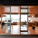 RI Offices / Arquitectura X - Offices Interiors, Door, Facade, Table, Chair