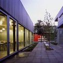 Hunter Douglas Plant / Mathias Klotz - Factory, Courtyard, Facade, Handrail, Table, Chair