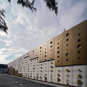 Dot envelope _ low cost shopping / OFIS Architects - Shopping Centers, Facade