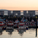 Fishermen warehouses in the port of Cangas / Irisarri + Piñera - Warehouse, Facade, Coast, Cityscape