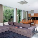 Split Level House / Indra Tata Adilaras - Sofa, Table, Windows