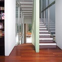 Split Level House / Indra Tata Adilaras - Shelving, Handrail