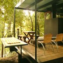 Recycled Materials Cottage / Juan Luis Martínez Nahuel - Table, Chair, Forest, Patio