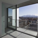 30 Dwellings in Manresa / nothing architecture - Apartments, Facade, Handrail, Door, Balcony, Chair