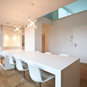 Apartment Building in Luxembourg / Metaform Architects - Apartments, Kitchen, Beam, Door, Table, Chair