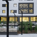 BBK Sarriko Centre / ACXT - Social Housing, Courtyard, Facade, Door, Bench