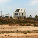 Casas Meteorito / NKS2 Architects - Vivienda Colectiva
