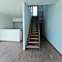 Affordable Housing in Prato  / studiostudio architetti urbanisti - Housing, Stairs, Handrail, Facade
