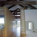 Principe's Box House / u+a arquitectura - Houses Interiors, Door, Beam, Arch, Facade, Handrail, Table, Chair