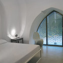 Casa en Puglia / Peter Pichler Architects - Renovación, Dormitorio, Arco, Camas