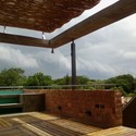 © Cecilia Román Vivienda Mburicao / Estudio ELGUE - Casas, Terraza, Fijación Vigas, Fachada, Pilares
