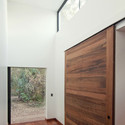 Cortesía de HLPS Arquitectos  Casa en Machali / HLPS - Casas, Puerta, Fachada