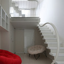 House In the suburb of Osaka / ANDO Corporation - Houses, Bedroom, Stairs, Handrail, Table, Chair