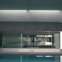 Swimming Center In Barbate / EDDEA - Swimming Pool, Facade, Chair