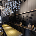 Origo Coffee Shop / Lama Arhitectura  - Coffee Shop, Kitchen, Beam, Countertop, Table, Lighting, Chair
