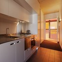 Sunday Apartments / Woods Bagot - Apartments, Kitchen, Door, Countertop, Sink, Lighting, Chair