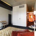 Sunday Apartments / Woods Bagot - Apartments, Bedroom, Door, Bed, Chair