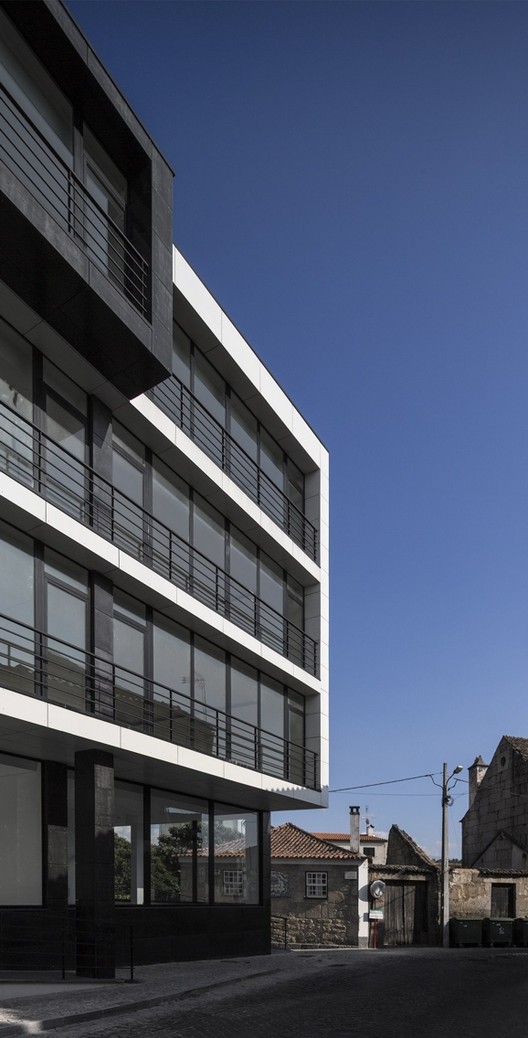 Vila Nova de Tazem Residential Building / Nuno Ladeiro + Marco Martins - Windows, Facade