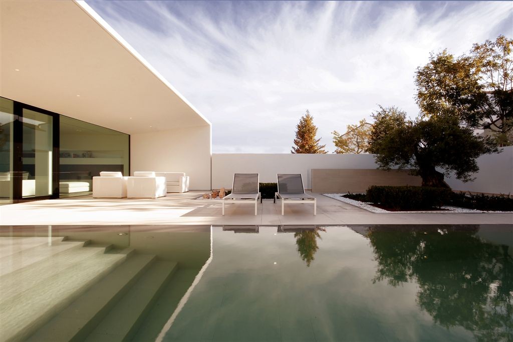Galeria de Jesolo Lido Pool Villa / JM Architecture - 20
