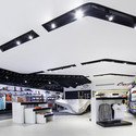 Tienda Quique / SYNArchitecture - Arquitectura Comercial
