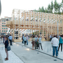 Orizzontale Illuminates Outdoor Theater with Recycled Keg Wall at MAXXI - Image 2 of 4