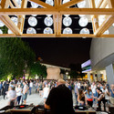 Orizzontale Illuminates Outdoor Theater with Recycled Keg Wall at MAXXI - Image 3 of 4