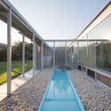 With 3 Kids, 2 Dogs and the Jungle / Osamu Morishita Architect & Associates - Facade, Courtyard