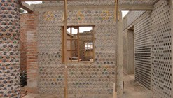 This Plastic Bottle House Turns Trash into Affordable Housing in Nigeria