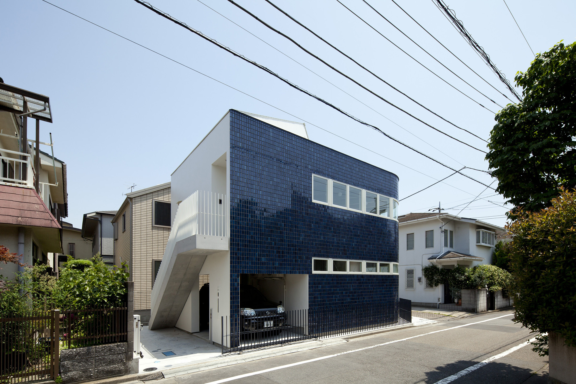 Gallery of Half & Half House / naf architect & design 7