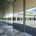 School in Saint-Maurice / Graeme Mann & Patricia Capua Mann - Schools , Door, Facade, Handrail, Table, Chair