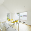 Residential Building at Heiligenstock / CHRIST.CHRIST.  - Housing, Kitchen, Facade, Handrail, Balcony, Table, Chair