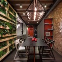 Loft in Kyiv / MARTINarchitects - Table, Shelving, Chair, Brick, Beam