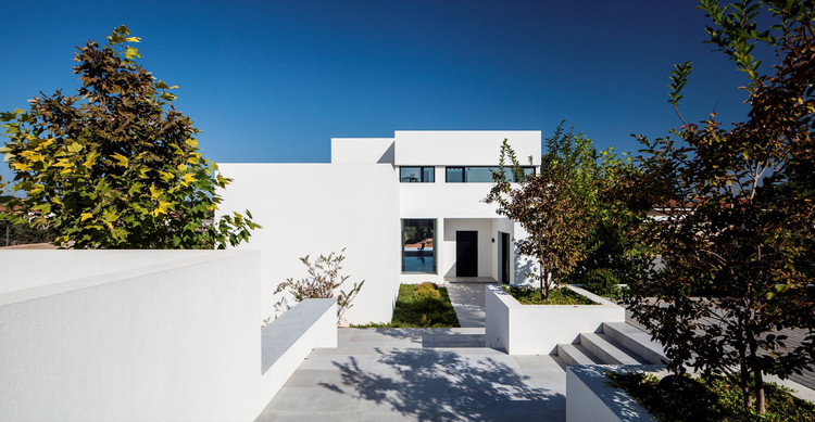 House in Kfar Vitkin / Levy-Chamizer Architects - Windows, Facade