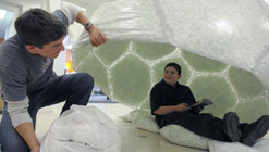 12 year old makes shelter for the homeless with plastic, wire and packing peanuts