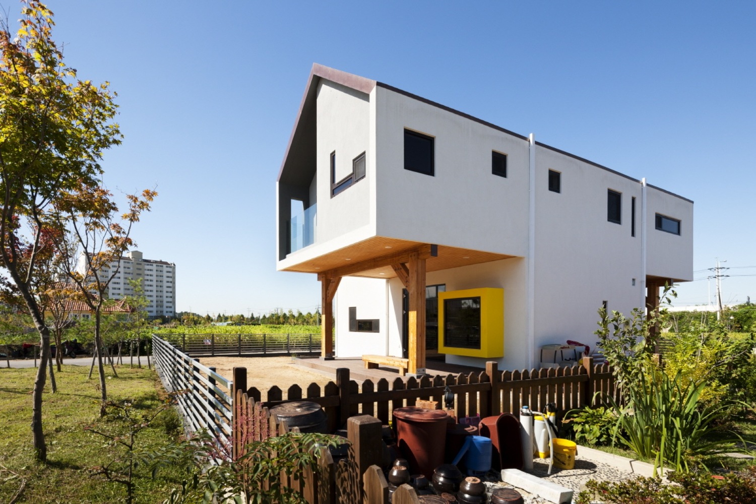 Casa-em-T Iksan / KDDH architects - Imagem 2 de 28