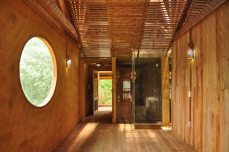 Nam Dam Homestay and Community House / 1+1>2 Architects - Door, Arch, Beam