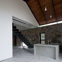 Casa con techo plegado / TOOB STUDIO - Casas