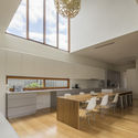 Backyard House / Joe Adsett Architects - Table, Chair, Countertop, Lighting, Windows, Beam