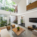 The Breathing Wall Residence  / LIJO.RENY Architects - Table, Sofa, Windows