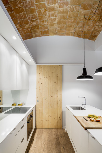 Refurbishment in Sarrià / Sergi Pons architects   - Countertop, Wood, Beam