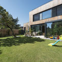 Dos construcciones / Compass Atelier - Casas