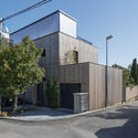 Dos construcciones / Compass Atelier - Casas