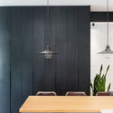 A functional Family Apartment  / RUST architects - Extension, Kitchen, Facade, Door, Table, Lighting, Countertop, Chair