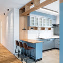A functional Family Apartment  / RUST architects - Extension, Kitchen, Beam, Door, Countertop, Table, Sink, Chair